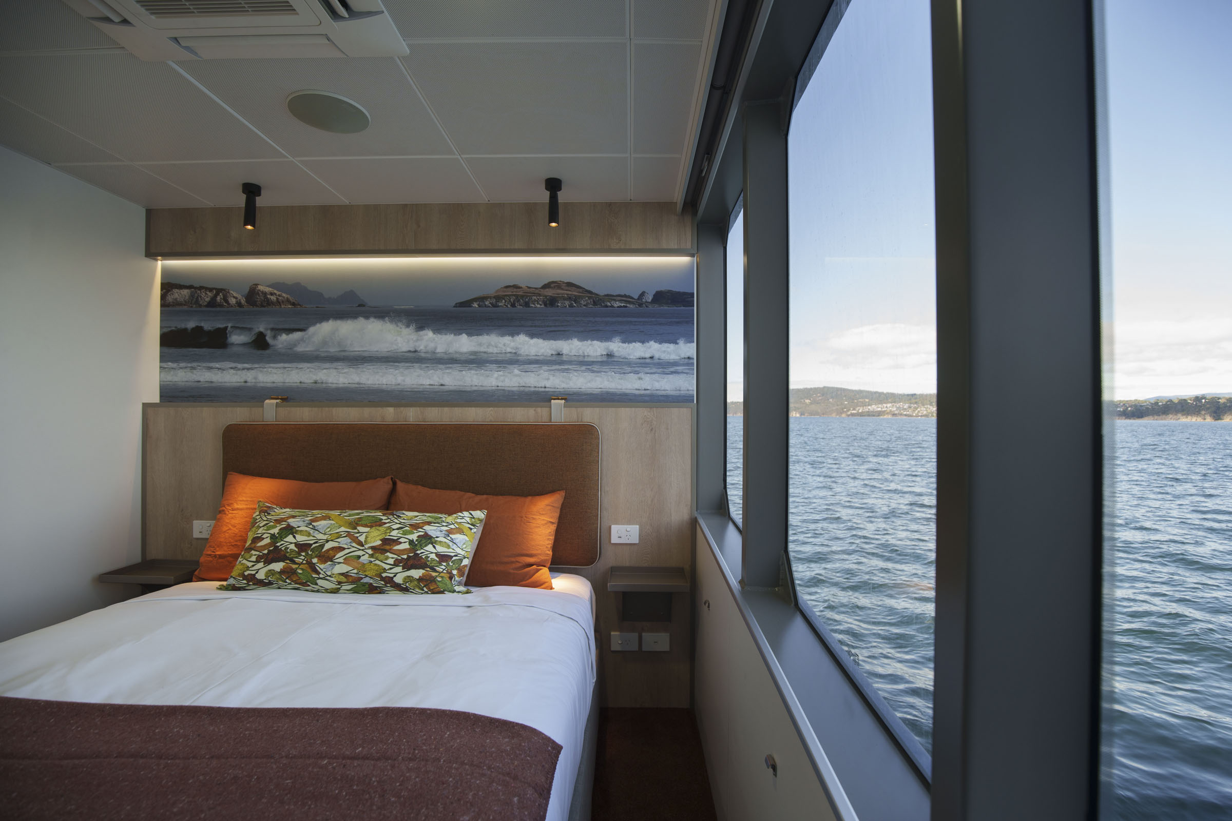 Welcome the wilderness in through large picture frame windows in each cabin