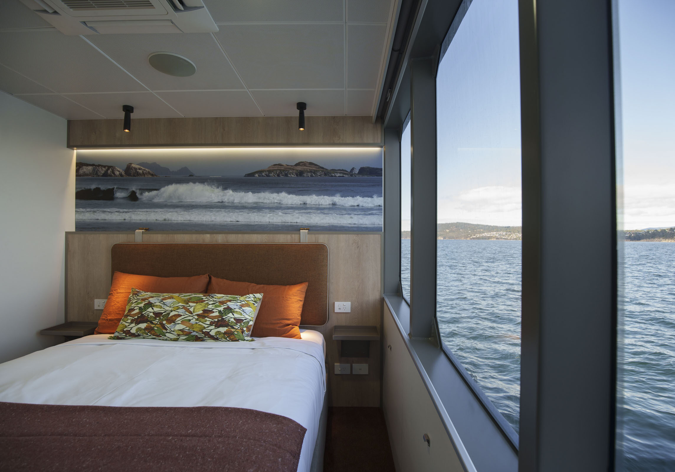 Welcome the wilderness in through large picture frame windows in each cabin